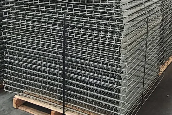 Wire decking installed on pallet racking beams