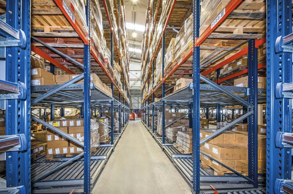 Carton flow racking with gravity-fed roller lanes