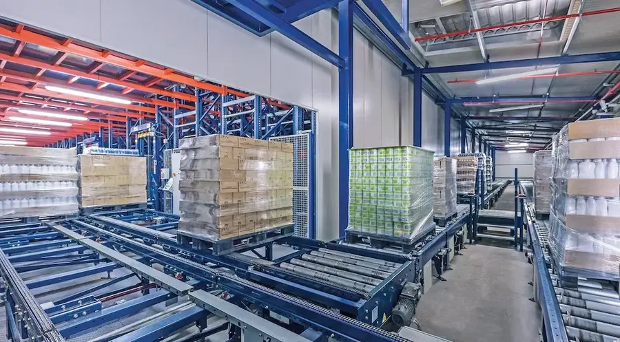 Conveyor system with merge and divert sections