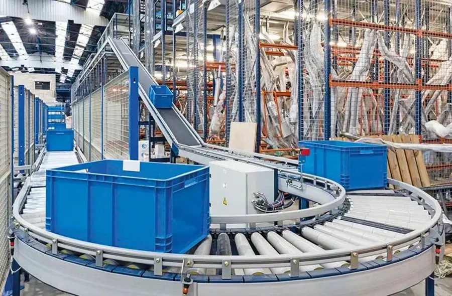 Overhead conveyor system in manufacturing facility