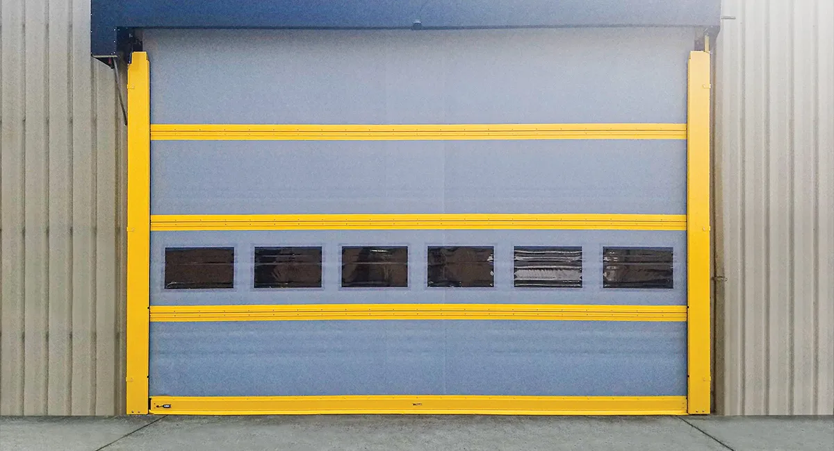 Yellow high-speed door at forklift traffic aisle