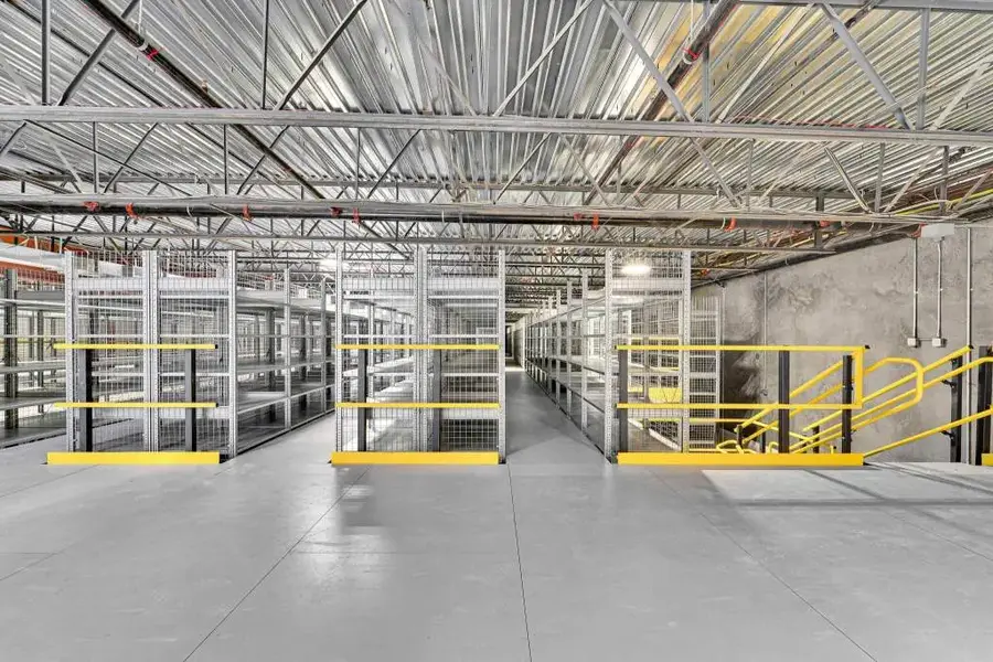 Structural steel mezzanine in warehouse facility