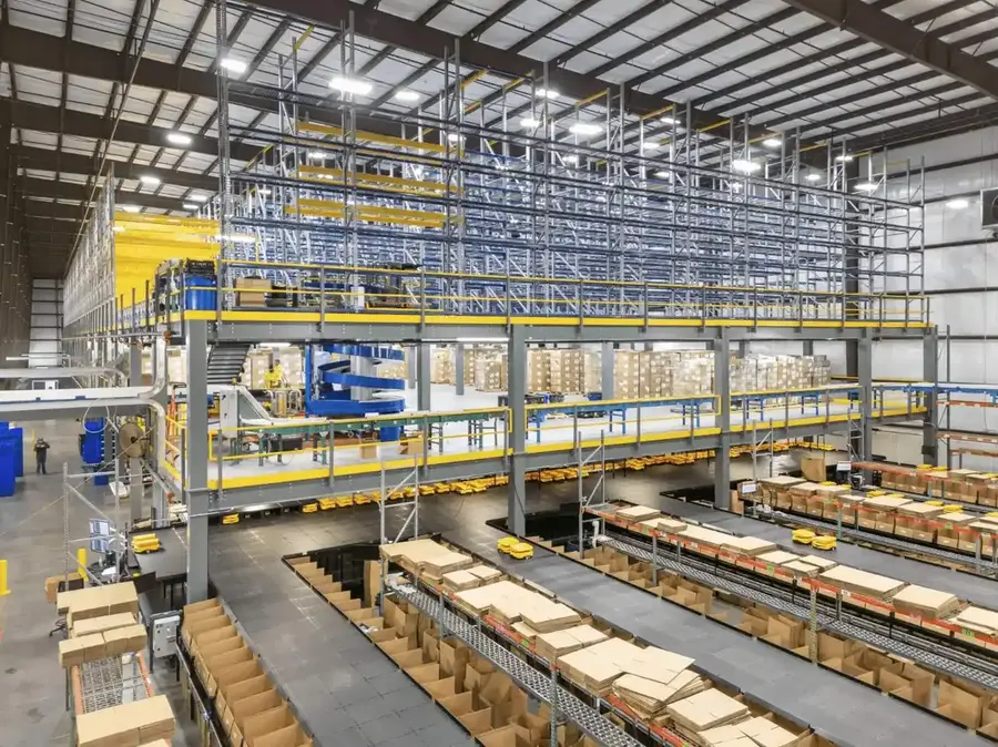 Two-level mezzanine system maximizing vertical space