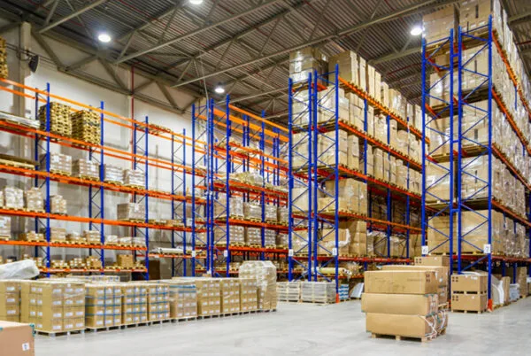 Teardrop pallet racking loaded with product pallets