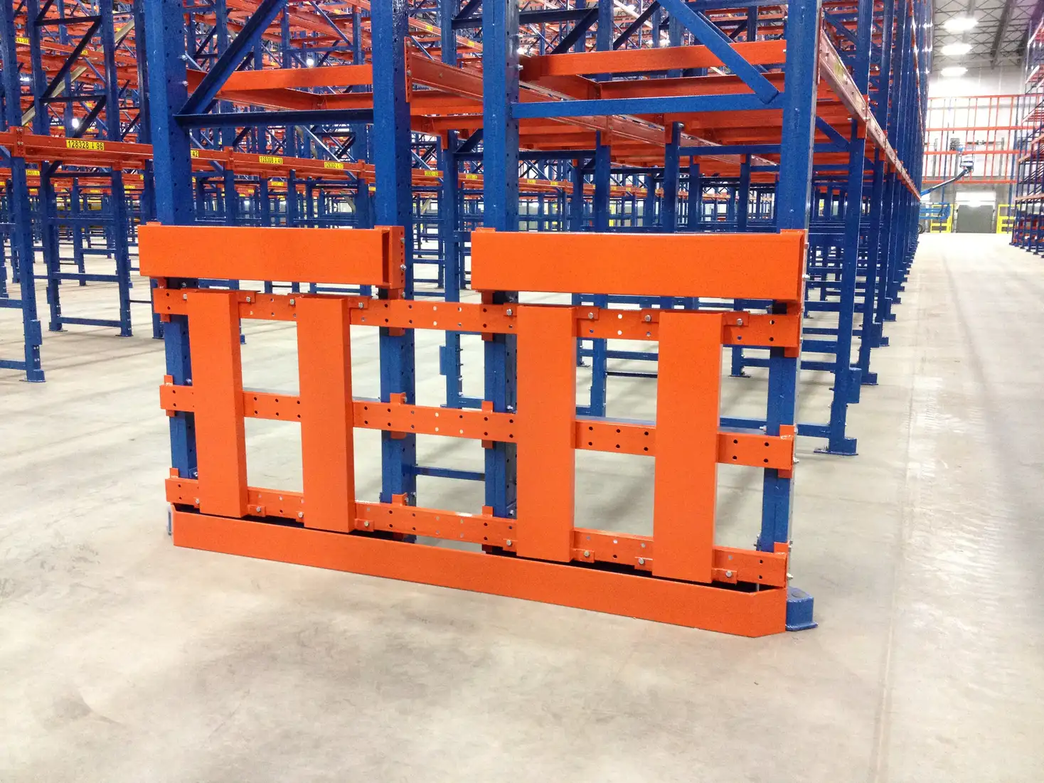 Multi-level push-back racking in distribution center